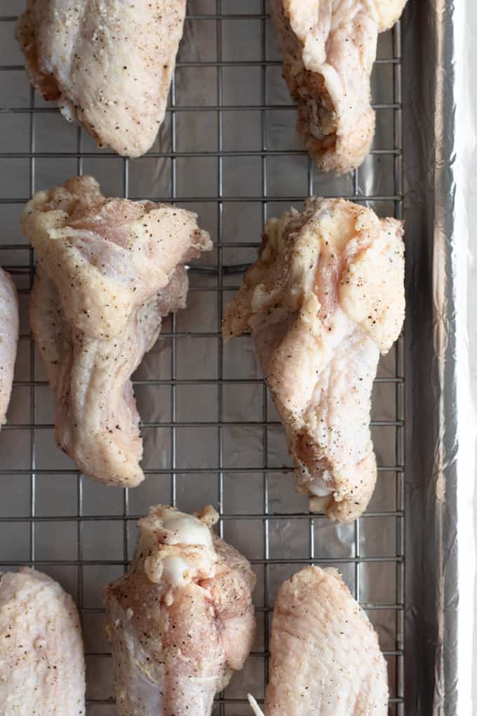 Chili Lime Chicken Wings. These BAKED chicken wings are simple to make and loaded with flavor thanks to a mixture of chili sauce and fresh lime juice and zest. The skin is so crispy on these you won't believe they aren't fried! Chicken Wings ready to bake