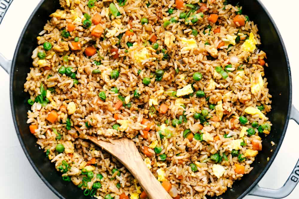 This Easy Fried Rice has always been one of the most-loved recipes on my site! I have made different versions, but this classic recipe is the one everyone keeps coming back to because it's so easy and delicious! Everything mixed together and garnished with green onions.