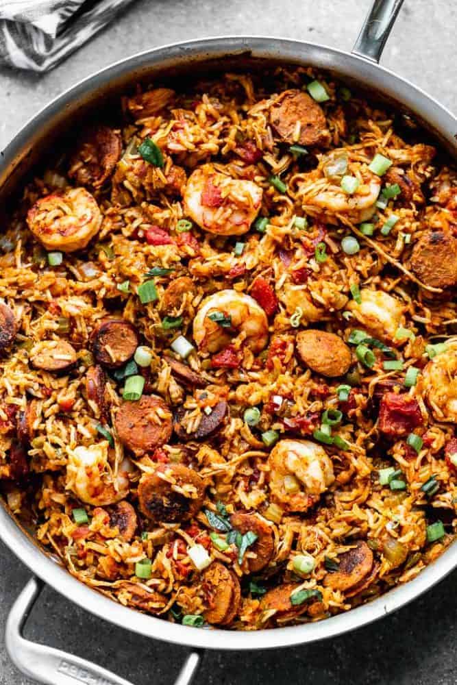 Thisย Easy Jambalaya Recipeย is packed with spicy andouille sausage, shredded chicken, sweet shrimp, and of course, plenty of vegetables and rice. Itโs the perfect one-pot meal for busy nights! easy jambalaya