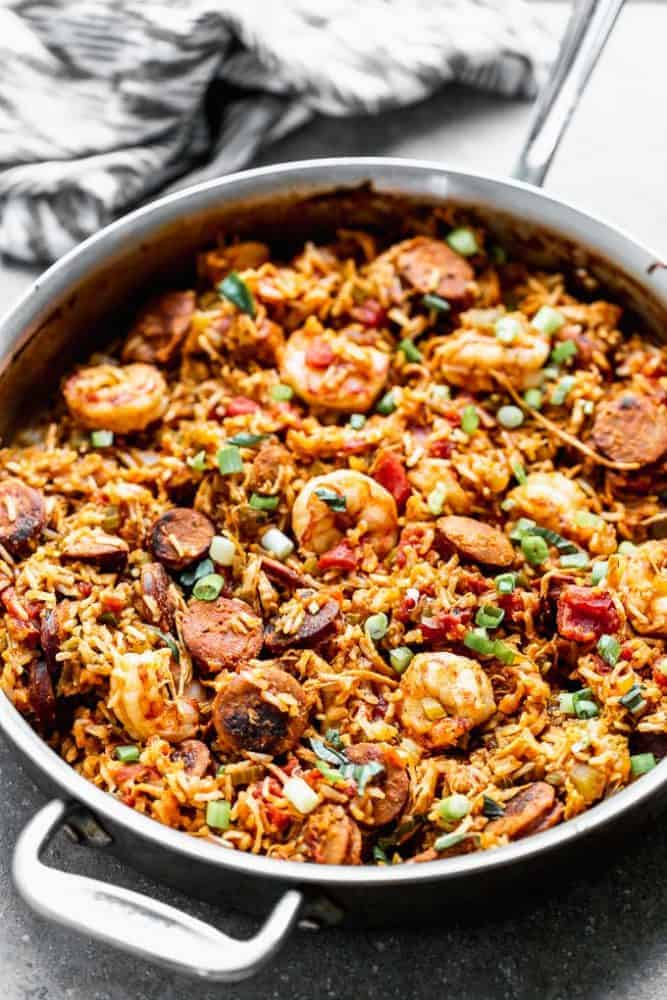 Thisย Easy Jambalaya Recipeย is packed with spicy andouille sausage, shredded chicken, sweet shrimp, and of course, plenty of vegetables and rice. Itโs the perfect one-pot meal for busy nights! Easy Jambalaya