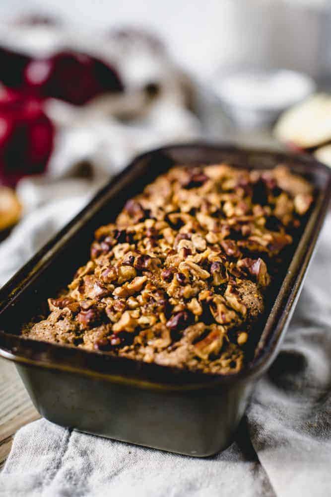 This densely soft Cinnamon Apple Bread is filled with fall flavor and packed with sweetened apples and walnuts. Serve this easy-to-make treat with breakfast or for a snack. cinnamon apple bread