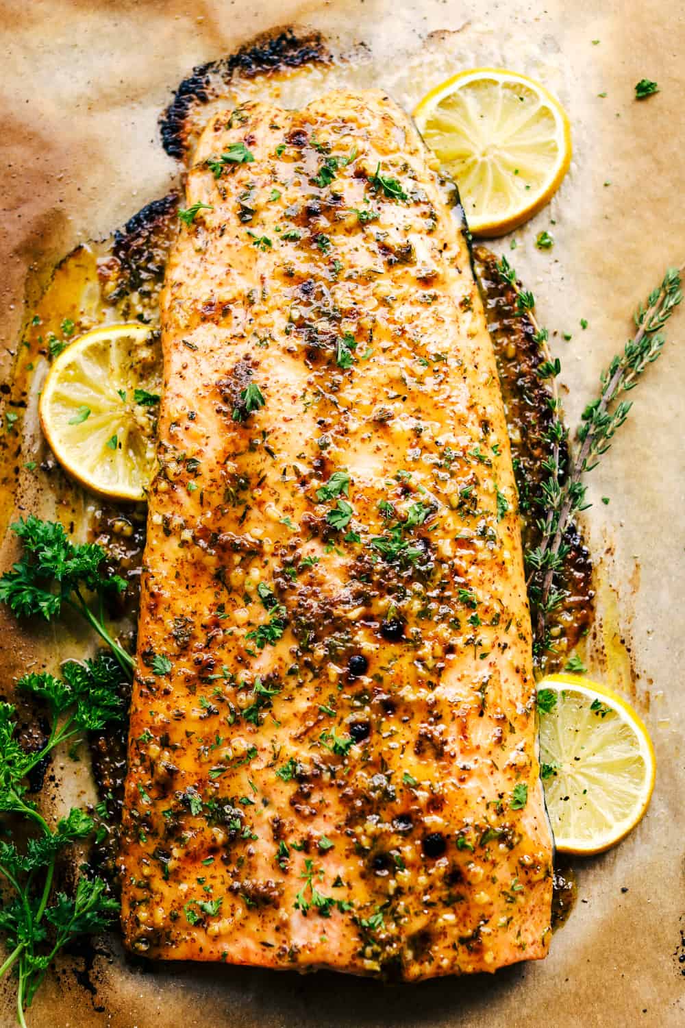 Honey Garlic Dijon Broiled Salmonย seasoned with herbs andย bย that comes together in just 15 minutes and literally has the best flavor ever! The best salmon of my life! honey garlic dijon broiled salmon