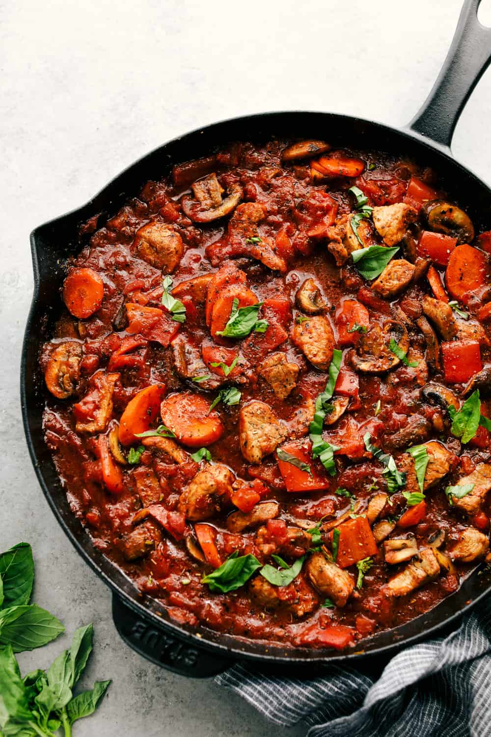 Skillet Pork Cacciatore is madeย with tender, slow roaster pork, mixed with garden vegetables and mushrooms, Italian herbs all simmered together for an easy 30 minute mealย that will be lovedย at the dinner table. ย An Italian favorite made with simpleย ingredients!ย Skillet Pork Cacciatore