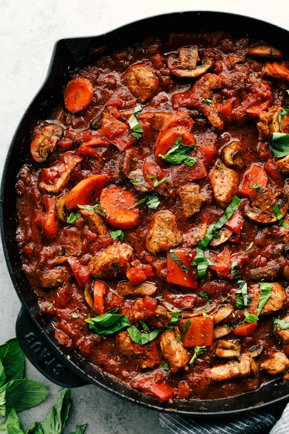 Skillet Pork Cacciatore is madeย with tender, slow roaster pork, mixed with garden vegetables and mushrooms, Italian herbs all simmered together for an easy 30 minute mealย that will be lovedย at the dinner table. ย An Italian favorite made with simpleย ingredients!ย skillet pork cacciatore