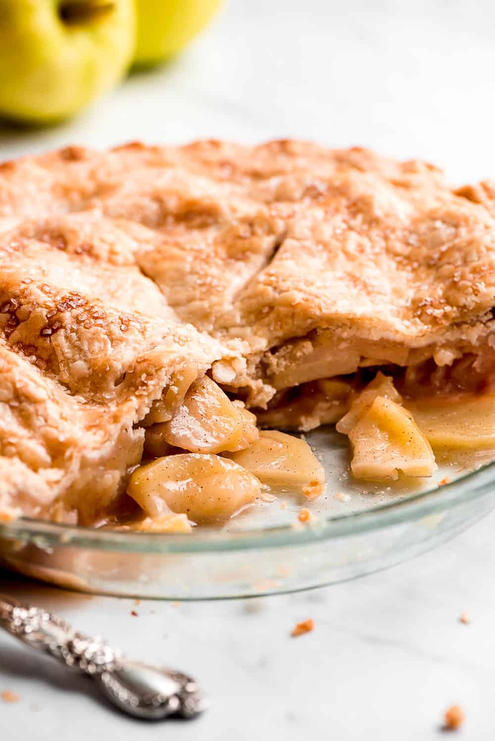 Apple Pie is a classic American favorite that is sure to hit everyone's dining room table each fall. The buttery flaky crust, sweet-tart apple filling, and warm cinnamon aroma makes this a slice of heaven. Top it with ice cream and you've got a dessert that is sure to hit the spot. Apple pie
