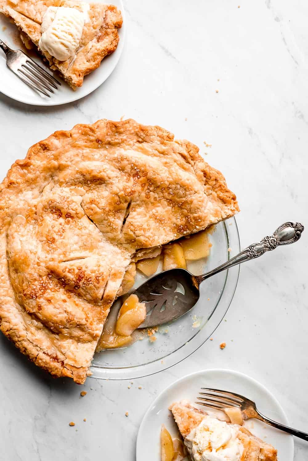 Apple Pie is a classic American favorite that is sure to hit everyone's dining room table each fall. The buttery flaky crust, sweet-tart apple filling, and warm cinnamon aroma makes this a slice of heaven. Top it with ice cream and you've got a dessert that is sure to hit the spot. apple pie