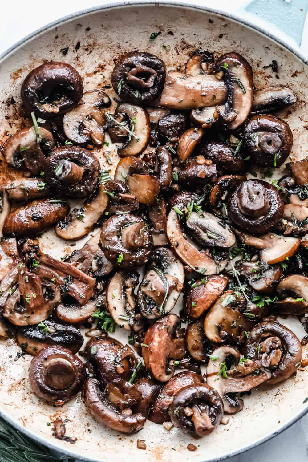 Buttery Herb Sautéed Mushrooms are tender mushrooms coated in a seasoned mixture that are sautéed until they are tender in a buttery herb sauce. The perfect side dish to any meal! buttery herb sautéed mushrooms