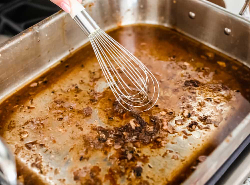 Rich, creamy, and ready in minutes, this turkey gravy is pure holiday comfort. Once you pour it over your turkey and mashed potatoes, you’ll never skip making it from scratch again. Someone whisking i chicken broth to the roasting pan with pan drippings.
