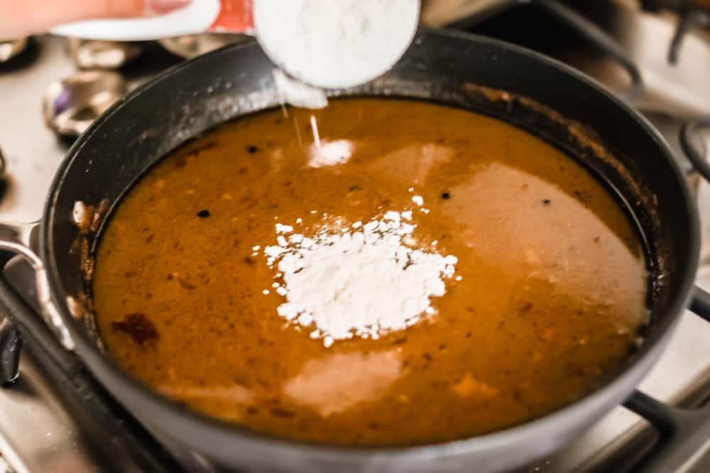 Rich, creamy, and ready in minutes, this turkey gravy is pure holiday comfort. Once you pour it over your turkey and mashed potatoes, you’ll never skip making it from scratch again. Adding flour to the gravy mixture.