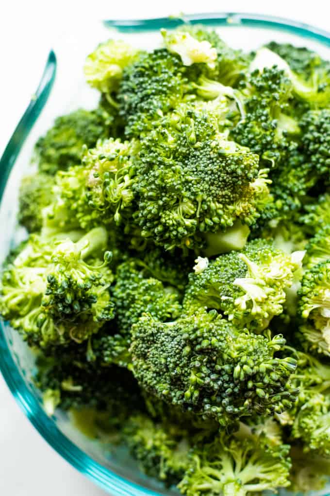 Broccoli Casserole. This cheesy, casserole is loaded up with fresh tender broccoli florets, baked in a homemade creamy cheese sauce, and topped with crispy buttered Panko crumbs. This casserole is sure to be a highlight! Bowl full of broccoli