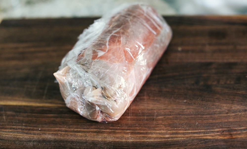 Best Ever Beef Wellington Recipe is a decadent tender and juicy beef tenderloin with a layer of mustard, mushroom sauce and prosciutto wrapped in a soft, buttery pastry that is cooked until golden brown. A holiday favorite! Tenderloin tightly wrapped in a plastic wrap