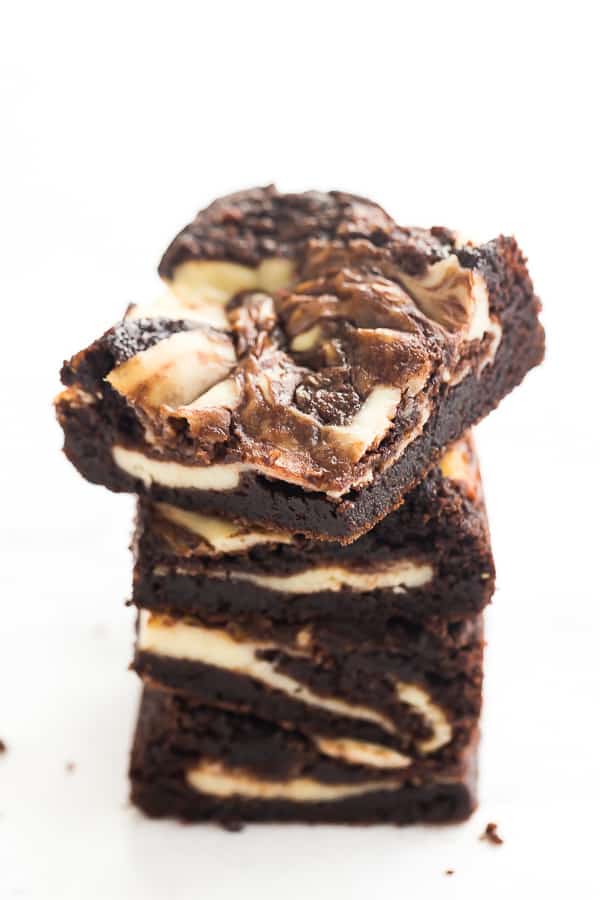 These Cream Cheese Brownies are ultra fudgy, and swirled with cream cheese for the ultimate chocolatey treat! They're freezer friendly and pair perfectly with a big scoop of ice cream. #brownie #chocolate #dessert cream cheese brownies stack
