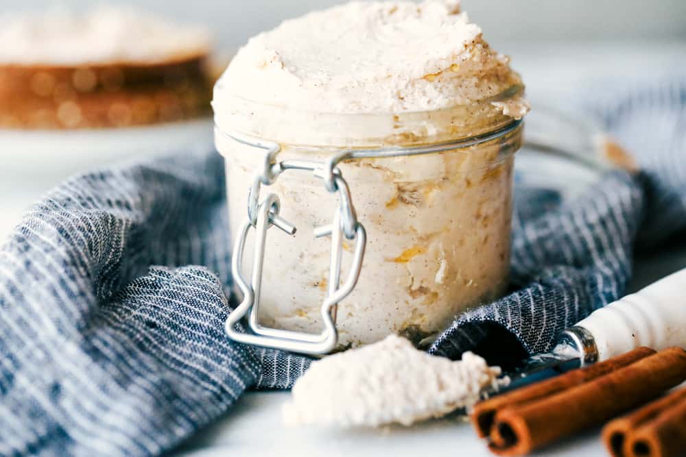 Maple Plant Butter (Three Ways!) is a smooth, creamy plant based butter that spreads perfectly over a piece of fresh bread and melts into all the cracks! You won't be able to live without it! Maple plant butter in a jar
