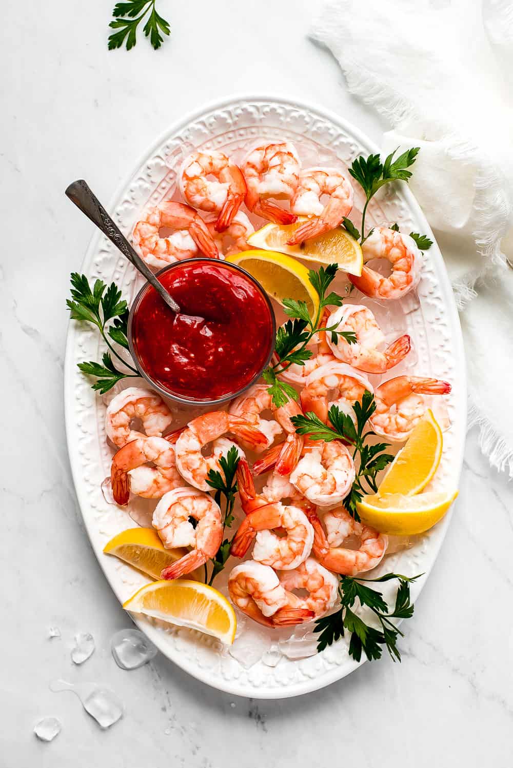 Shrimp Cocktail is a classic party appetizer that needs to be at your next gathering! This party favorite is easy to throw together and can be made in advance.ย shrimp cocktail sauce