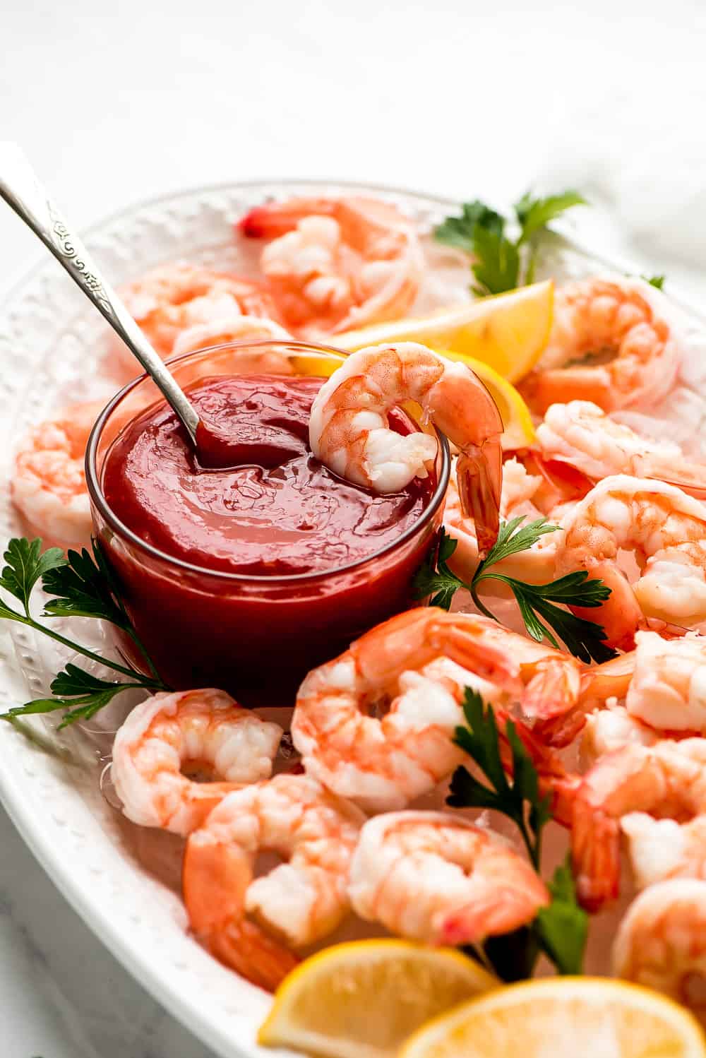 Shrimp Cocktail is a classic party appetizer that needs to be at your next gathering! This party favorite is easy to throw together and can be made in advance.ย shrimp cocktail