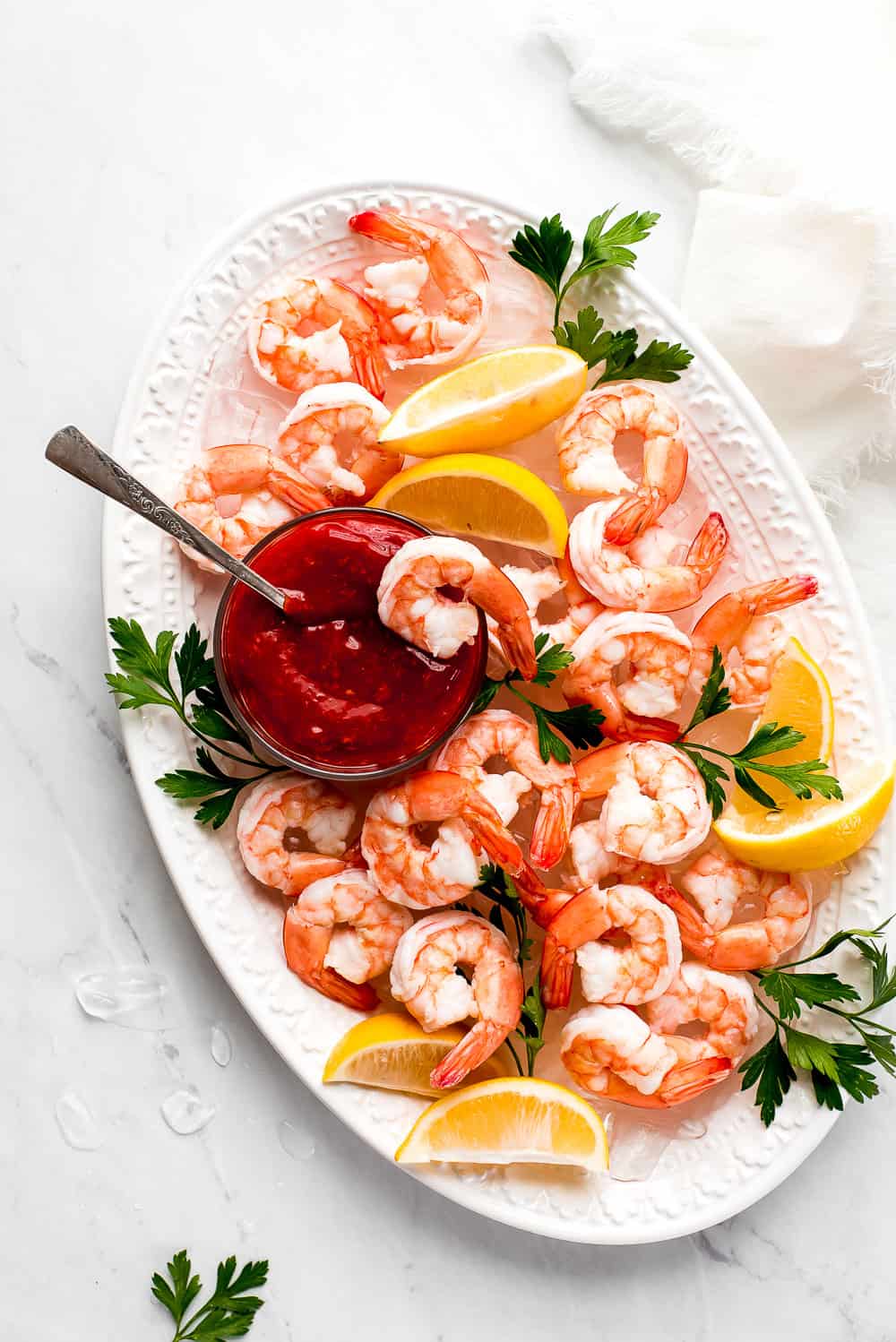 Shrimp Cocktail is a classic party appetizer that needs to be at your next gathering! This party favorite is easy to throw together and can be made in advance.ย Shrimp Cocktail
