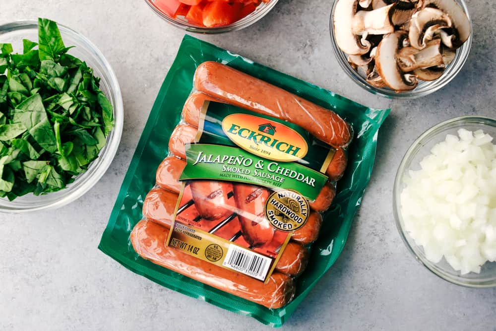 Sausage Mushroom Breakfast Bake is a blend ofย sautรฉed smoked sausage and fresh vegetables, added to a scrambled egg mixture then baked in less that 30 minutes. Thisย breakfast bake is perfect for theย holidays!ย Eckrich jalapeno & Cheddar smoked sausage packet