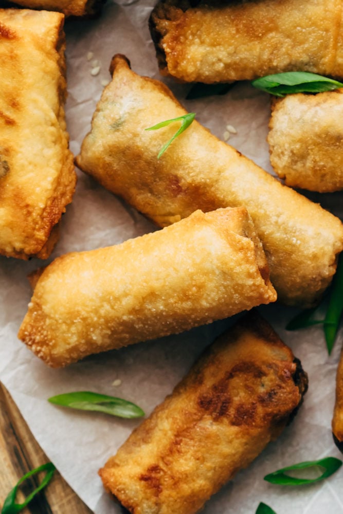 Egg Rolls - make yourย favoriteย takeout appetizer at home now! It's incredibly easy, they freeze well and taste absolutely amazing! Closeup of egg rolls