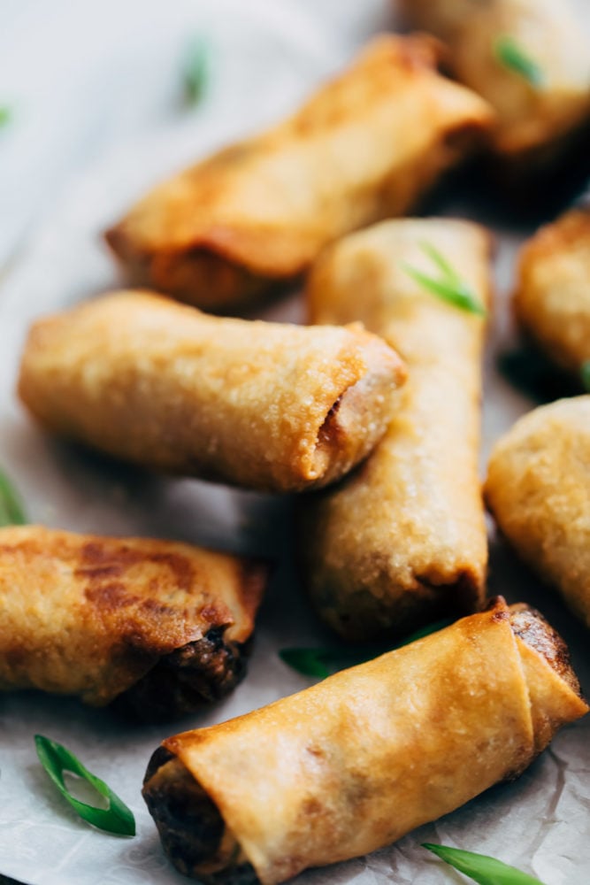 Egg Rolls - make yourย favoriteย takeout appetizer at home now! It's incredibly easy, they freeze well and taste absolutely amazing! Closeup of egg rolls