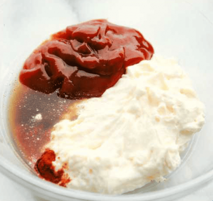 Born and raised in Utah—the true home of fry sauce—I’ve perfected this recipe to pair with just about everything. This isn’t your average ketchup-mayo mix. The secret ingredient? Pickle Brine. Stay with me! It brings the BEST tang to the sauce!! All of the ingredients added to a bowl.
