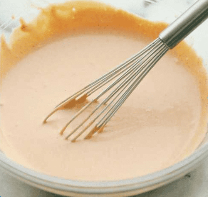 Born and raised in Utah—the true home of fry sauce—I’ve perfected this recipe to pair with just about everything. This isn’t your average ketchup-mayo mix. The secret ingredient? Pickle Brine. Stay with me! It brings the BEST tang to the sauce!! All of the ingredients whisked together in a bowl.