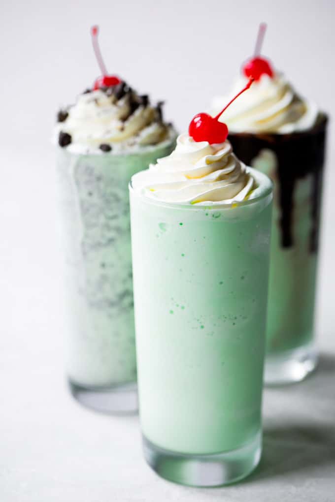 line at the drive-thru and make your own at home! Three tall shamrock shakes with whipped cream and a cherry on top.