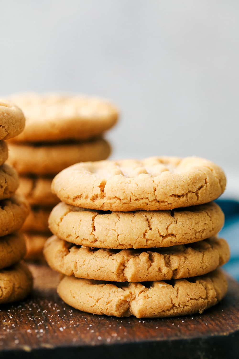 Easy 3 Ingredient Peanut Butter Cookies are soft, fluffy and full ofย creamy peanut butter with sweet sugar and a large egg, it is that simple. Only 3 Ingredients to make theseย deliciously desirable cookies!ย 3 Ingredient peanut butter cookies stacked together on top of each other.