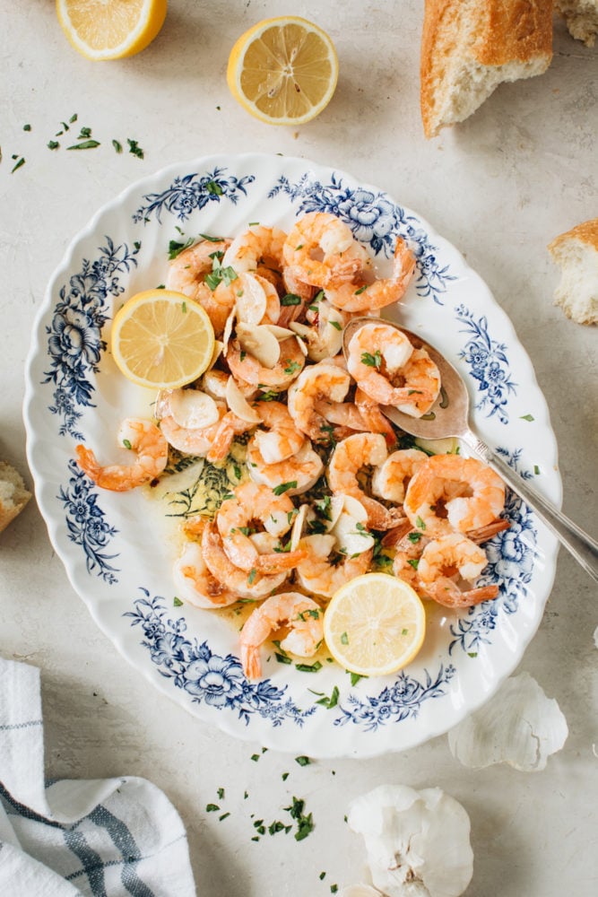 Classic Shrimp Scampi is a delicious recipe of pan-cooked shrimp drenched in decadent garlic butter and lemon sauce. This simple shrimp dish is made in minutes and is best served over pasta or with crusty bread for dipping. shrimp scampi recipe