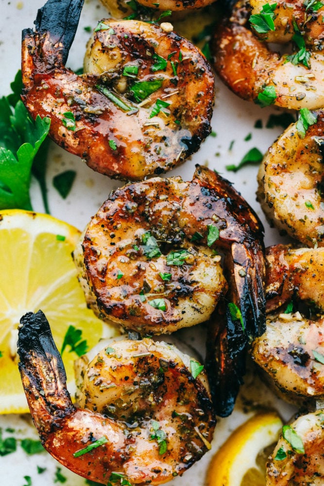 The BEST Grilled Shrimp is the perfect weeknight meal because it is super quick, full of flavor, and so easy to make!ย Everyone will absolutely love and devour it!! Close up on finished shrimp.