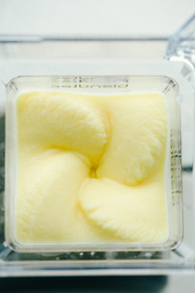 This Pina Colada is a sweet, creamy, frozen drink bursting with fruity flavors from pineapple and coconut. The flavors are so vibrant, they will transport you from your porch to a lounge chair at a tropical beach! Blending a pina colada.