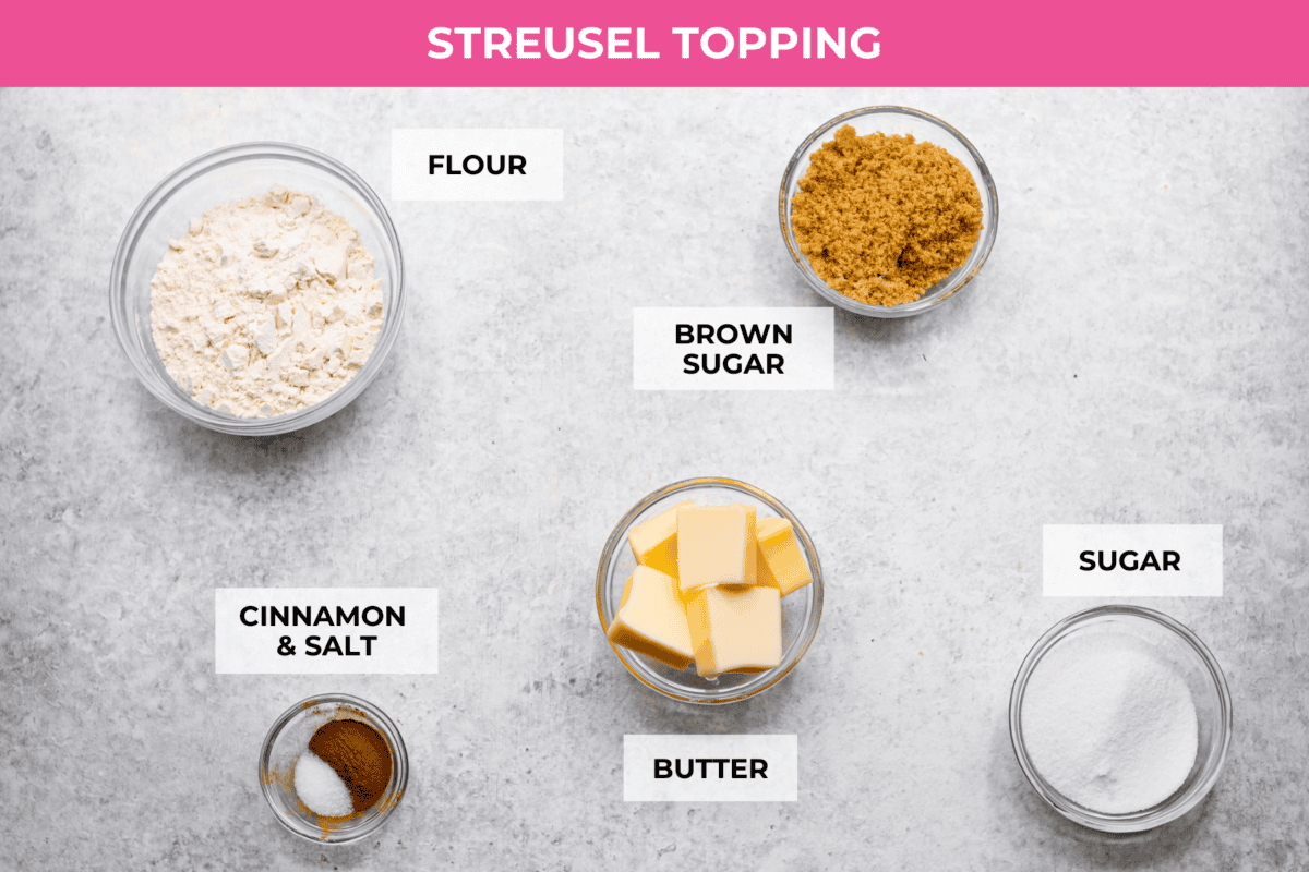 This classic cinnamon coffee cake is loaded with decadent cinnamon sugar swirls and topped with crumbly cinnamon streusel. It's the perfect treat to share at any brunch, book club, or dessert for any night of the week. The warm, satisfying aroma will fill your heart and your home! Overhead shot of labeled streusel topping ingredients for the coffee cake.