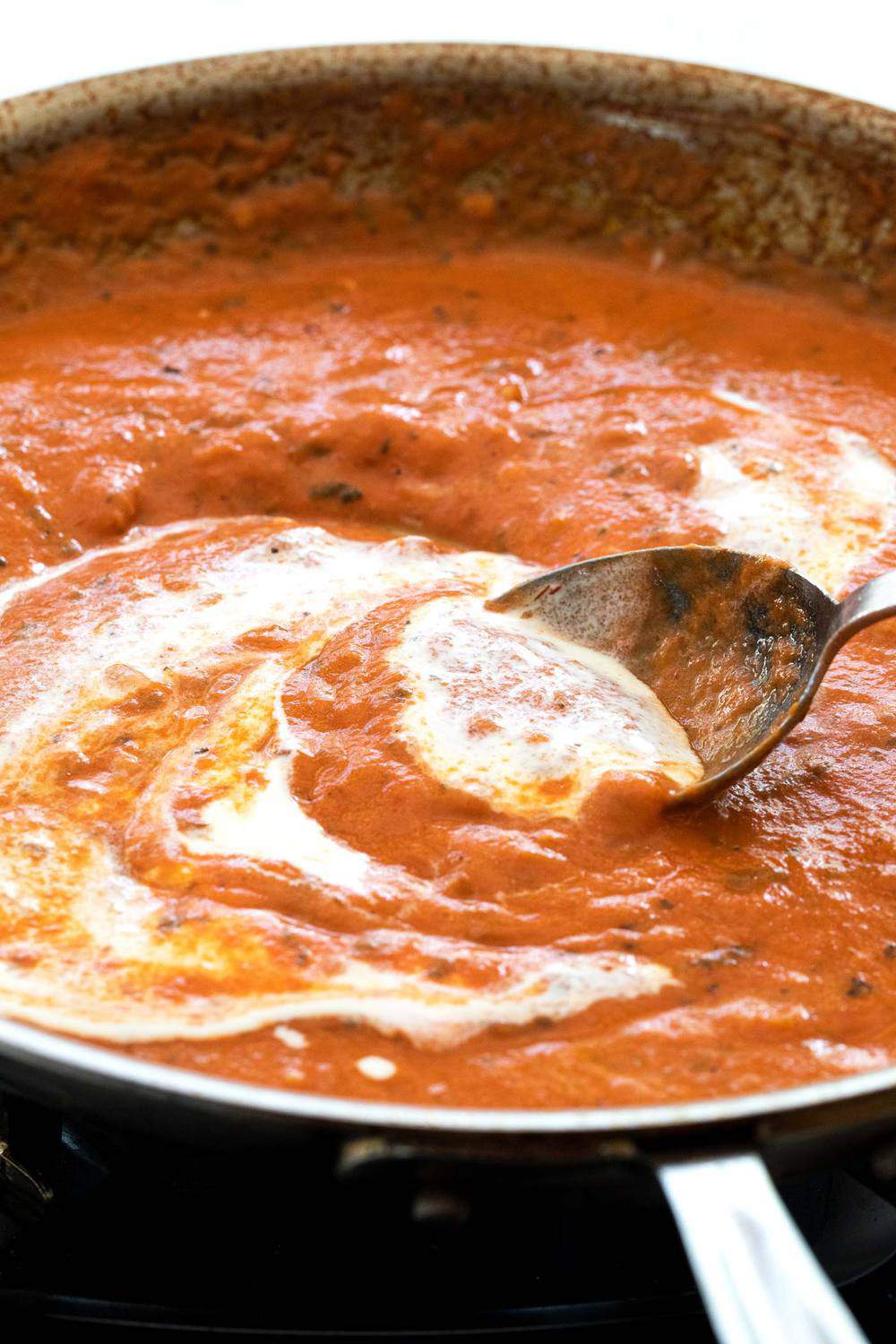 Baked chicken spaghetti is an easy dinner casserole to feed a family. Tender pieces of chicken tossed with tender noodles and a creamy tomato sauce. Marinara sauce with cream