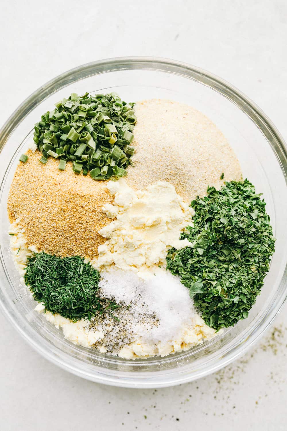 Perfectly seasoned, Homemade Ranch Seasoning Mix is easy, quick and oh so good! A glass bowl filled with all the seasonings.