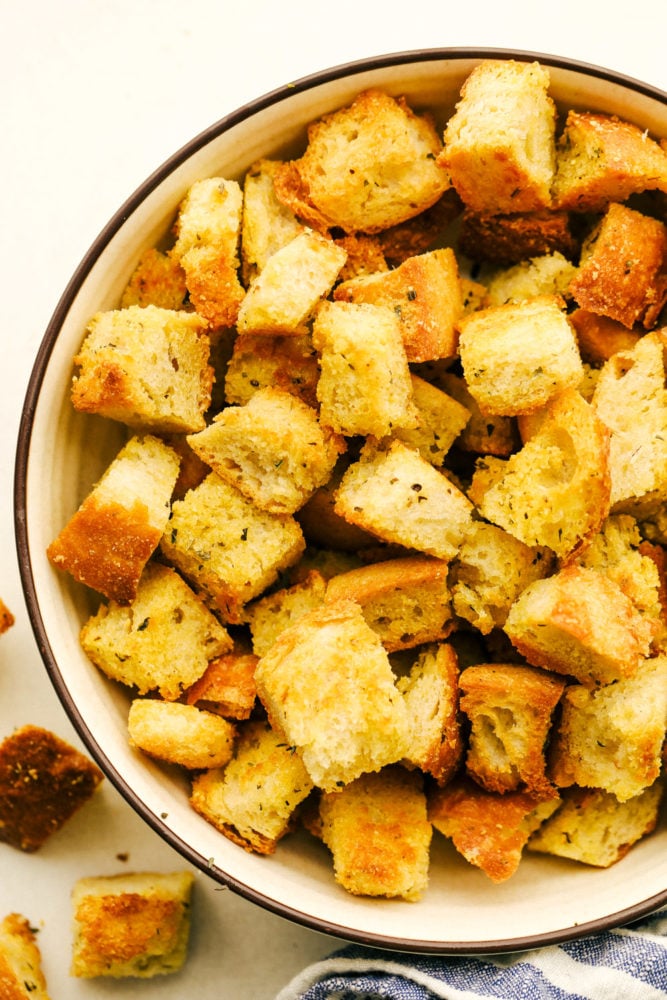 Crunchy, perfectly seasoned and addicting, these Homemade Croutons are the Best. After you see how easy and simple it is you'll never buy store croutons again. They will crunch, but then melt in your mouth. You will want to make salad or soup just to eat these. Crispy, savory, perfectly seasoned croutons.