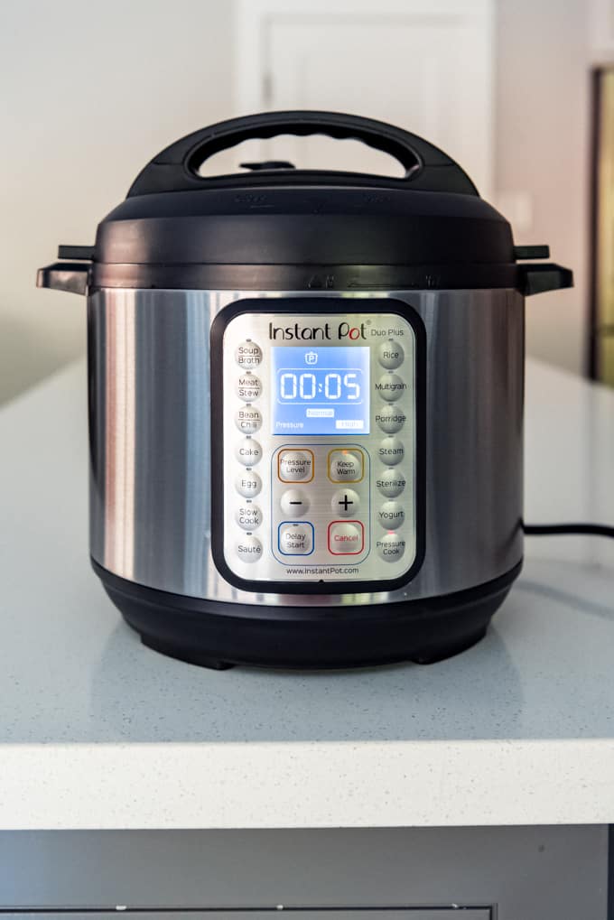 Instant Pot Hard Boiled Eggs are hands down the best thing to make in your electric pressure cooker! Not only do they turn out perfect every time, but they peel better than any other method! An Instant Pot set to cook on high pressure for 5 minutes.