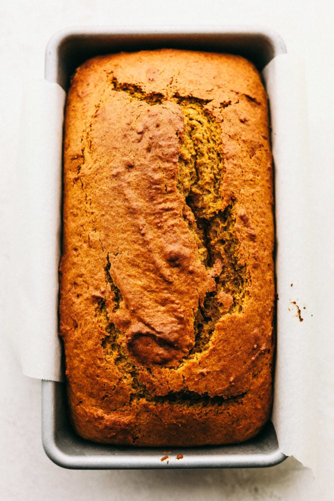 This Absolutely Perfect Pumpkin Bread is moist, spiced and will fill your home with the most amazing aroma. Your friends and family will devour this flavorful bread that screams it's time for fall. This is such an easy quick bread, you'll make it all the time. Perfectly spiced moist and tender pumpkin bread in a loaf pan.