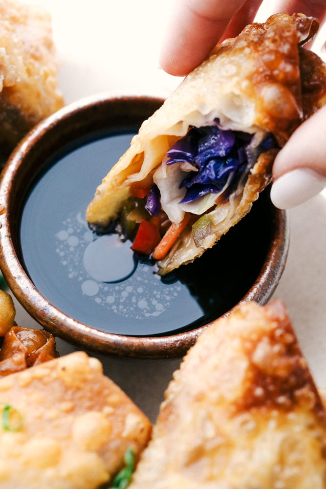 Vegetable Egg rolls are filled with colorful, crunchy flavorful veggies and fried till golden crispy brown. These are a homemade take on a classic take out favorite. Super easy and so delectable you'll never buy them again!ย Vegetable Egg Rolls, crispy colorful crunchy veggies fried to perfection.