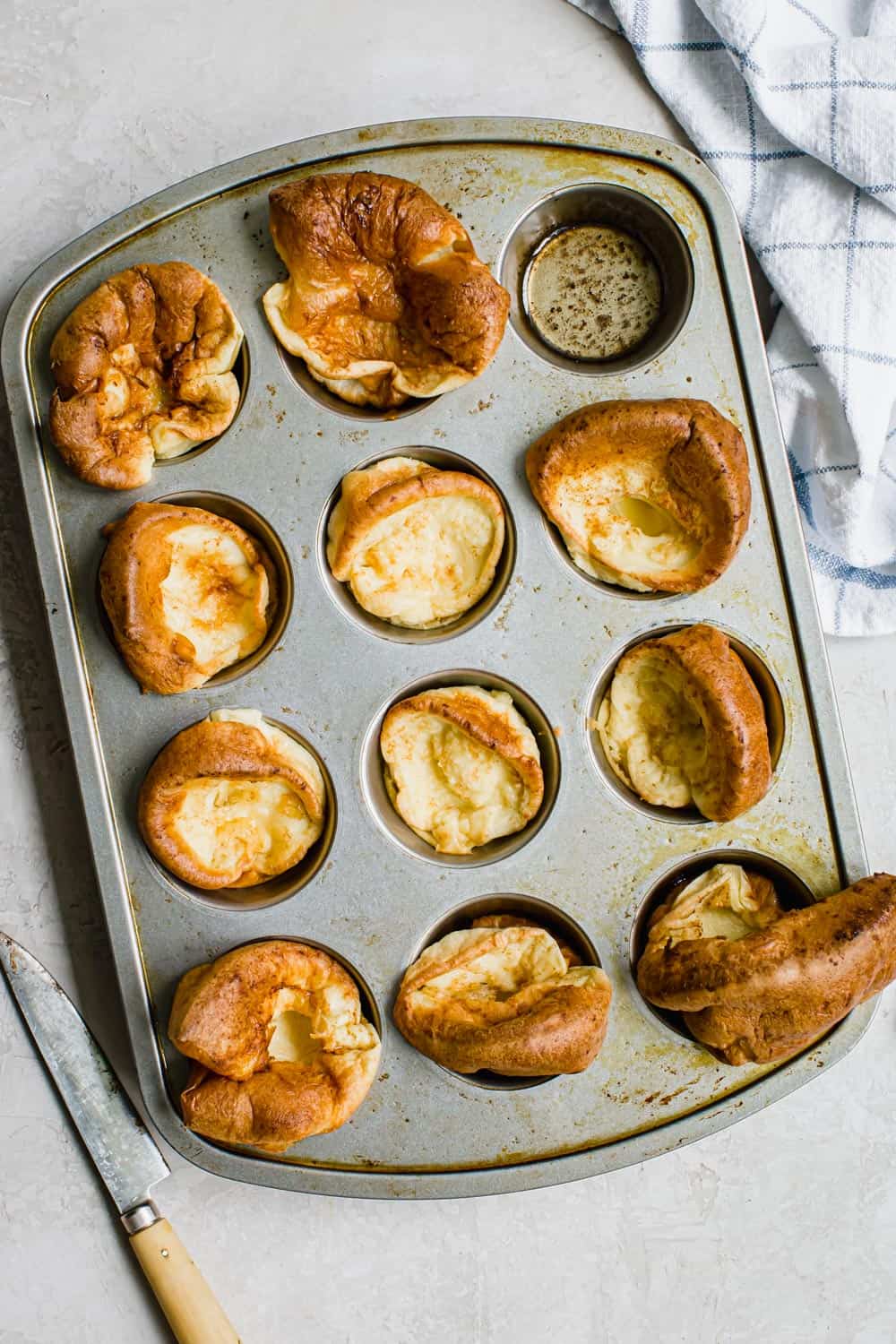 Light and fluffy with an egg-like taste, Yorkshire Pudding is a delicious side dish perfect for serving with your Sunday roast. This easy recipe will show you how to prepare the dish traditionally with beef drippings or using standard fats like butter and oil. Easy Yorkshire pudding in a muffin tin.