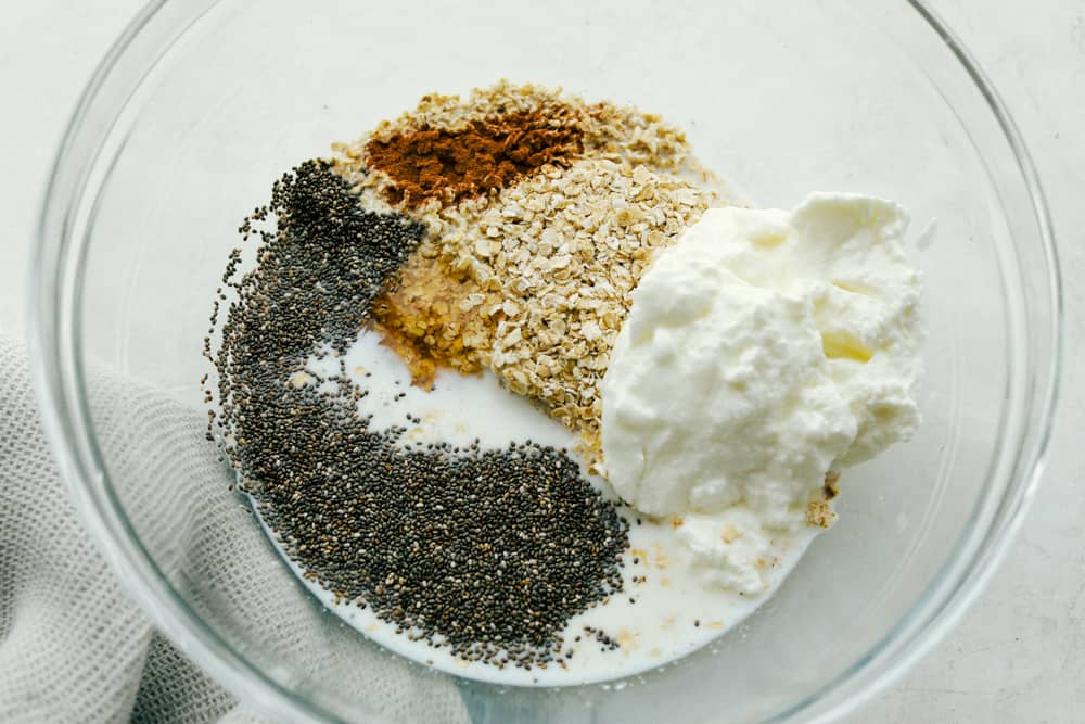Overnight Oats are a healthy, versatile, make ahead, portable filling breakfast to get you on your way. These oats have to be one of the best inventions EVER! The basic ingredients for making over night oats.