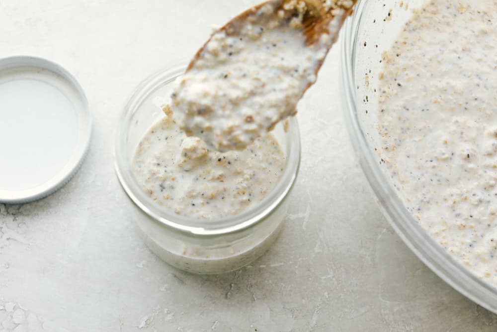 Overnight Oats are a healthy, versatile, make ahead, portable filling breakfast to get you on your way. These oats have to be one of the best inventions EVER! Overnight oat mixture in a jar for soaking.