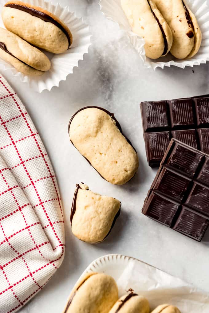 Homemade Milano Cookies have tender cookies with a nice crunch sandwiched around a layer of rich dark chocolate in the center! They taste even better than the store bought version! An overhead shot of an milano cookie.