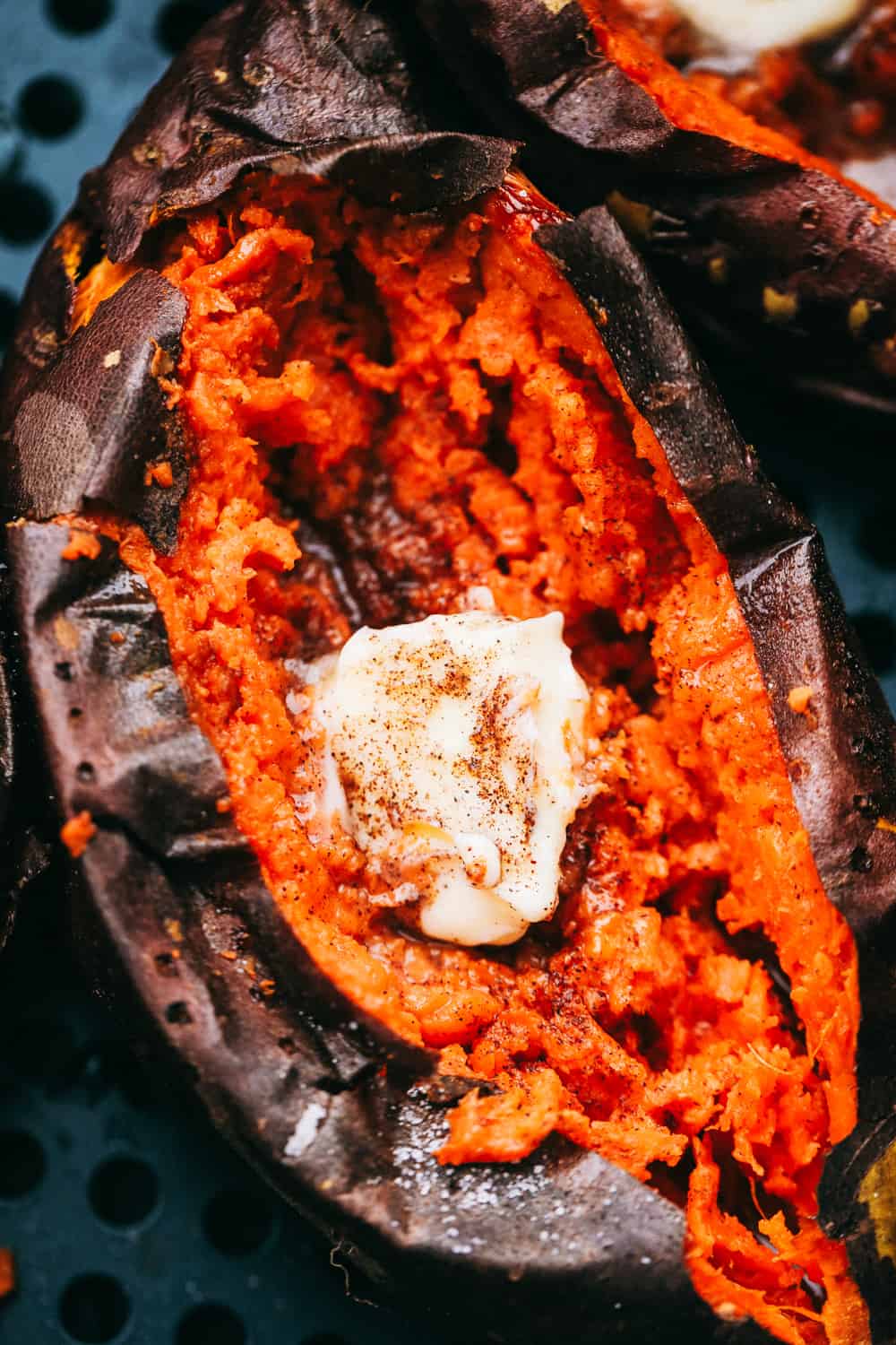 Perfectly fluffy and tender on the inside, crispy on the outside, these Air Fryer Sweet Potatoes are going to rock your world! They are so creamy inside it's amazing. Just add your favorite topping and you'll have a new favorite way to eat these delicious sweet potatoes. Creamy inside, perfectly roasted Sweet Potatoes