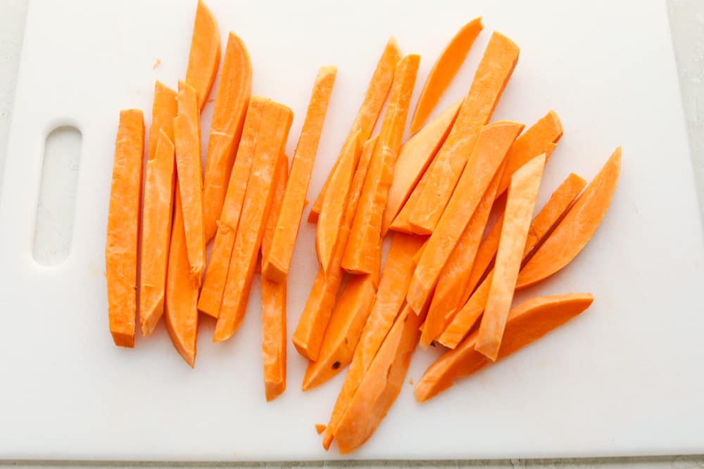 Perfect Air Fryer Sweet Potato Fries are crispy outside and tender inside. Lightly seasoned and golden, they are a delicious addition to any meal. These are a healthy way to indulge without the guilt. Pair them with your favorite dipping sauce and your side dish is done! Sweet potato peeled and cut into sticks.