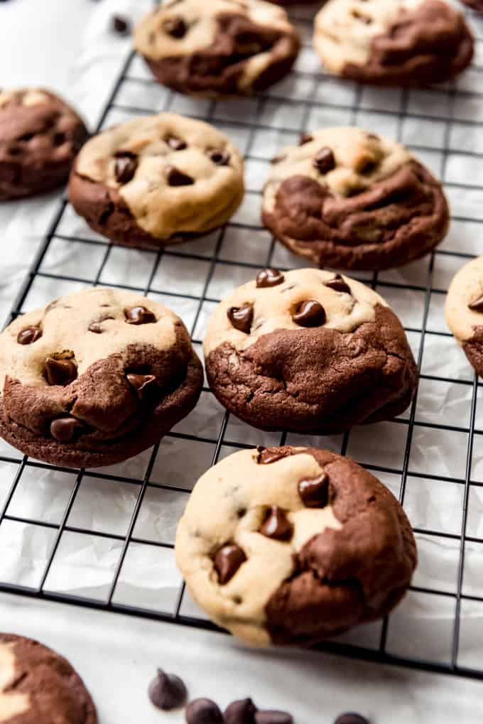 Brookies Cookies are a deliciously fun mashup of two of our favorite desserts: brownies and chocolate chip cookies! Soft and chewy with plenty of chocolate chips, these are always a hit with the family! brookies cookies on a wire rack
