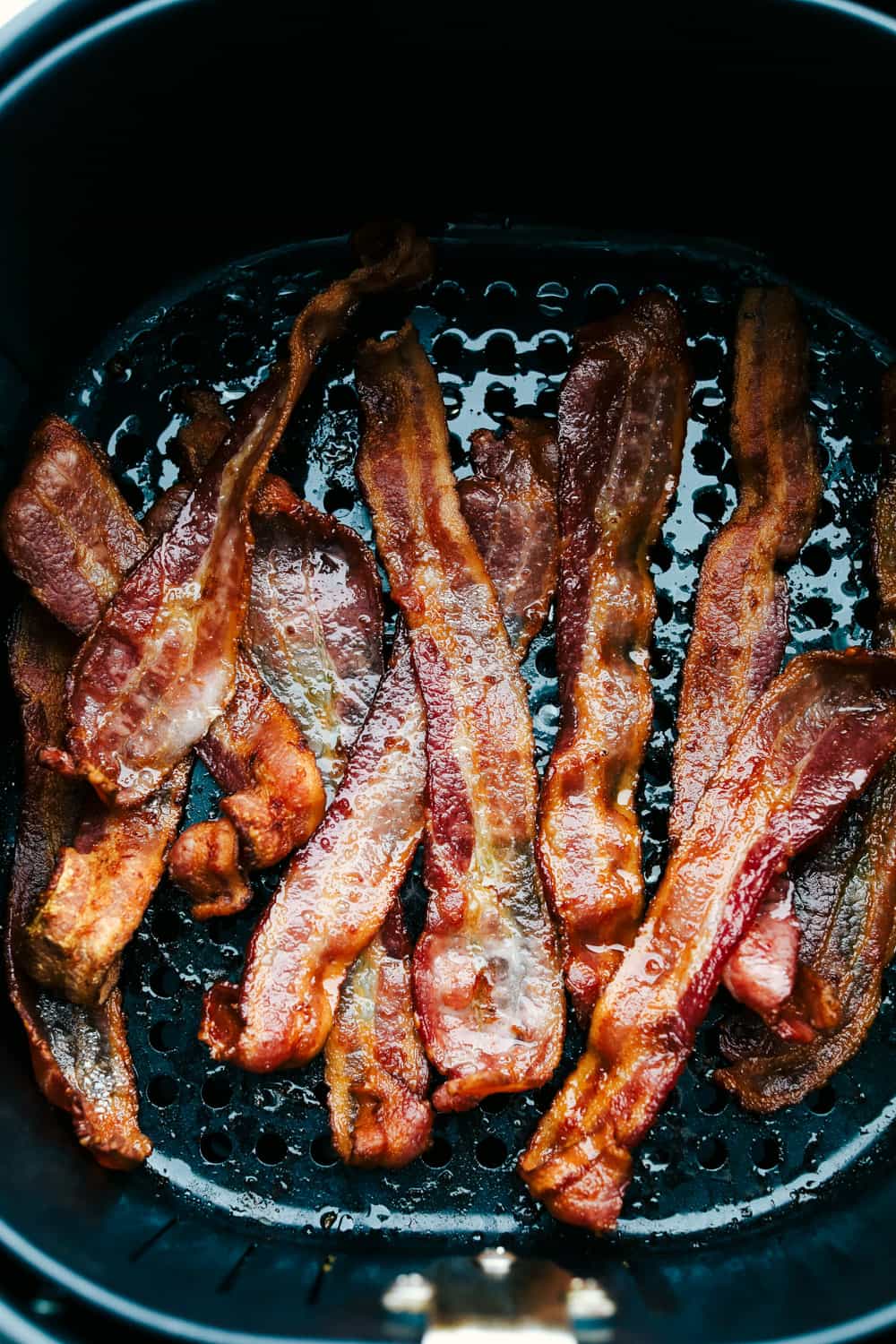 You know how much I love my air fryer, and this might be my favorite hack yet: Air Fryer Bacon! It’s ready in 10 minutes, no flipping, no mess, and turns out perfectly crispy every single time Perfectly crisp air fryer bacon.