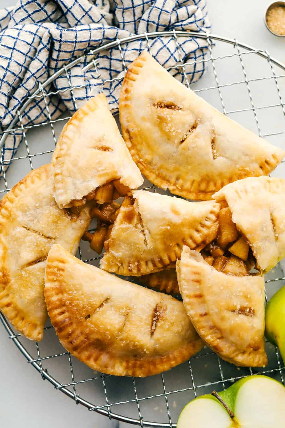 Seriously Amazing Air Fryer Hand Pies are an easy way to have dessert! Tender sweet spiced apples in a flakey crust you can hold in your hand! Hand held apple pies made in the air fryer.