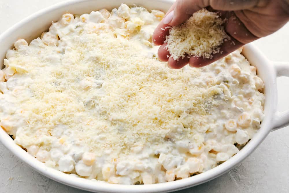 Easy, creamy and cheesy Hominy Casserole is a side dish that is sure to impress. This is not your average dish, it takes hominy to a whole new level. Putting the cheese topping on top of hominy casserole.