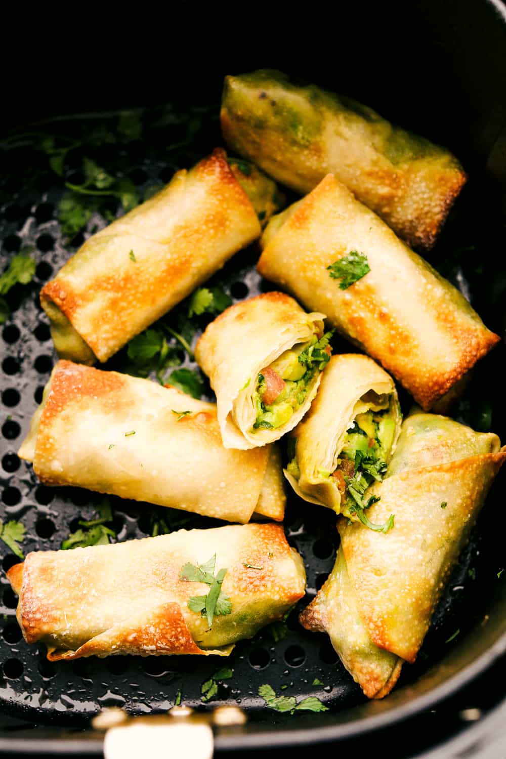 Whether it is for a party or for your own private dinner, Avocado Egg Rolls in an air fryer are the appetizers to make. Crispy and golden on the outside, creamy and decadent on the inside. You have to try these! Crispy air fryer avocado egg rolls in the air fryer.