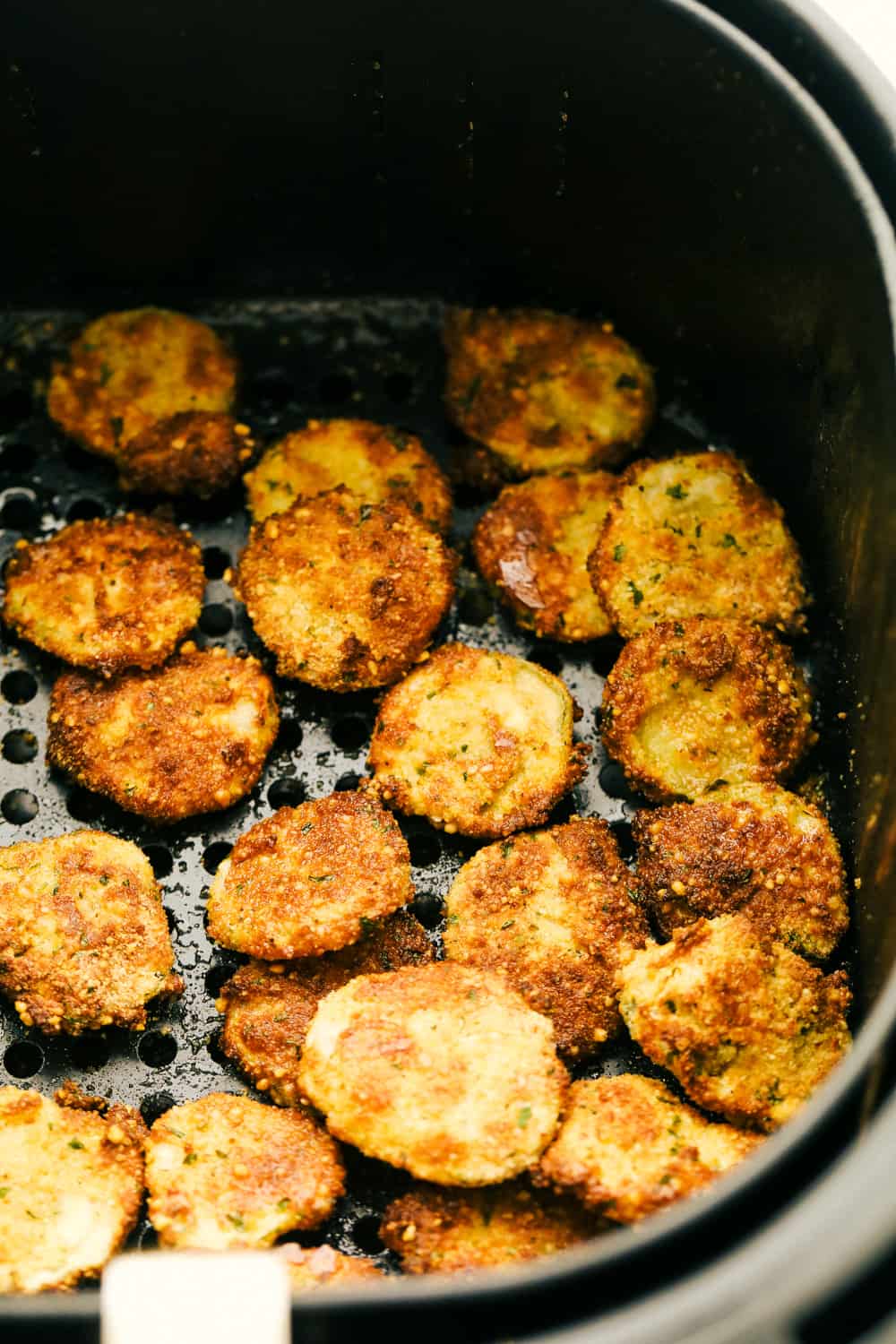 Air Fryer Fried Pickles are the ultimate appetizer! They are tangy, zippy and perfectly seasoned! Battered pickles perfectly air fried.