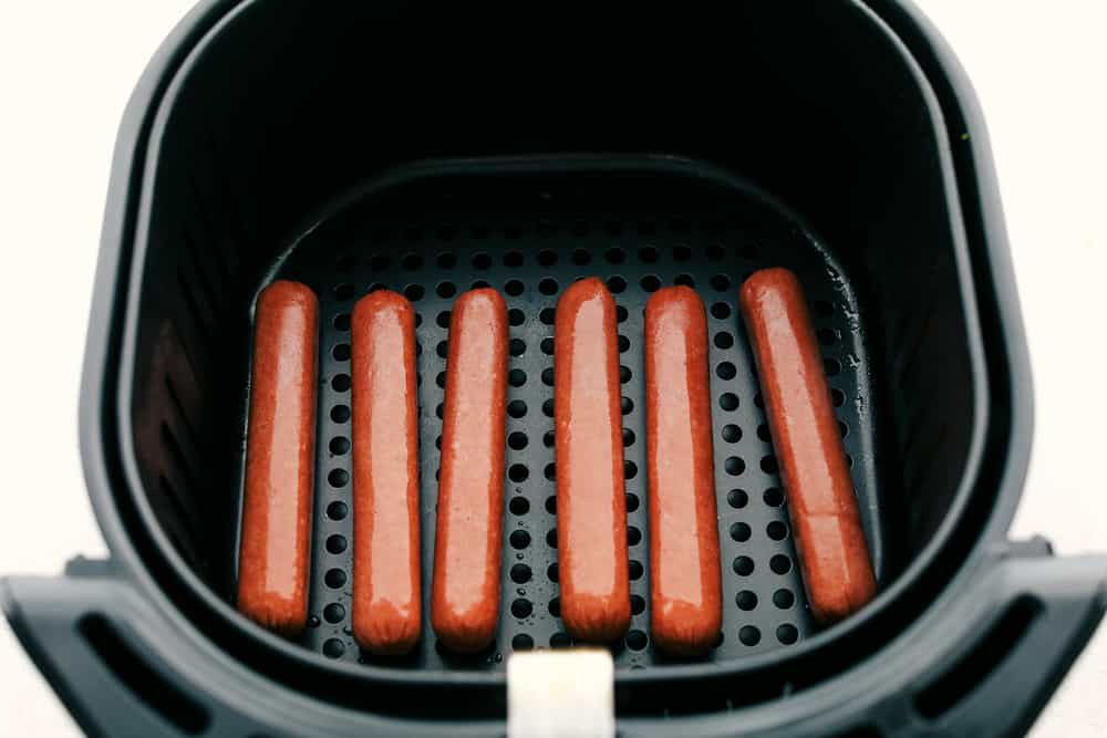Air Fryer Hot Dogs taste better than any grilled, boiled or game-day hot dog you have ever had! Making them in the Air Fryer is a game changer! Hot dogs ready to cook.